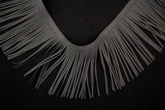 Fransenborte Wildleder Optik