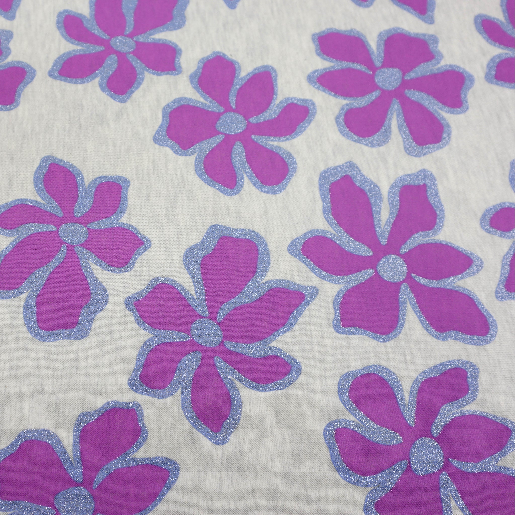 Sweatshirtstoff mit glitzernden Blumen auf meliertem Hintergrund in 2 Farbvarianten vom Buntspecht Shop