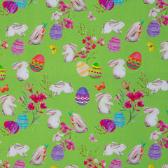 Reststück: 1,50m -Baumwolle Happy Easter Eier & Häschen grün