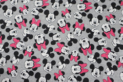 Reststück : 1,40m -  French Terry Lizenz  Minnie Mouse  - hellgrau meliert mit pinker Schleife -