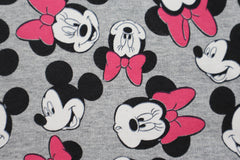 Reststück : 1,40m -  French Terry Lizenz  Minnie Mouse  - hellgrau meliert mit pinker Schleife -