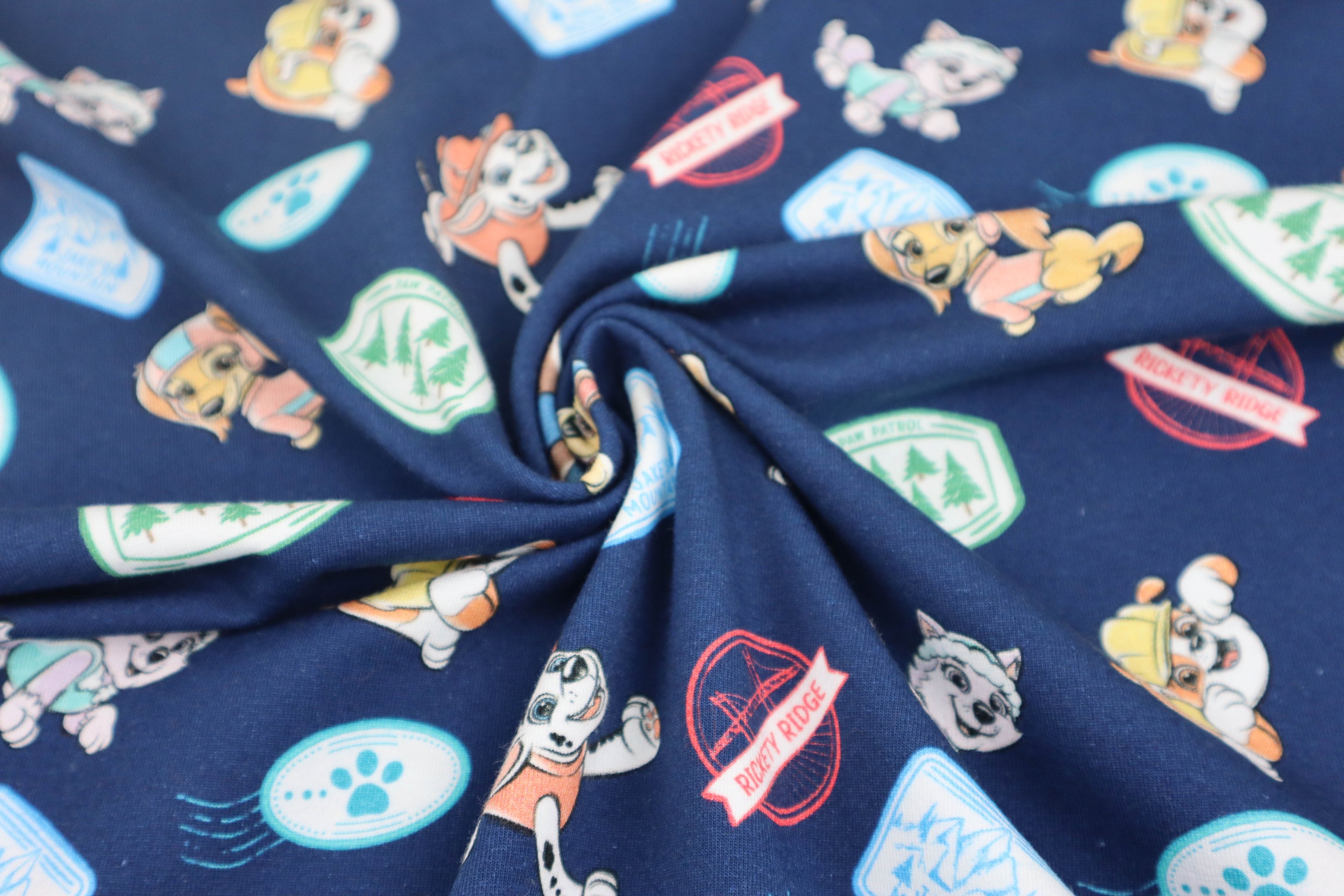 Baumwolljersey Paw Patrol - Sticker Print in dunkelblau bei Der Buntspecht