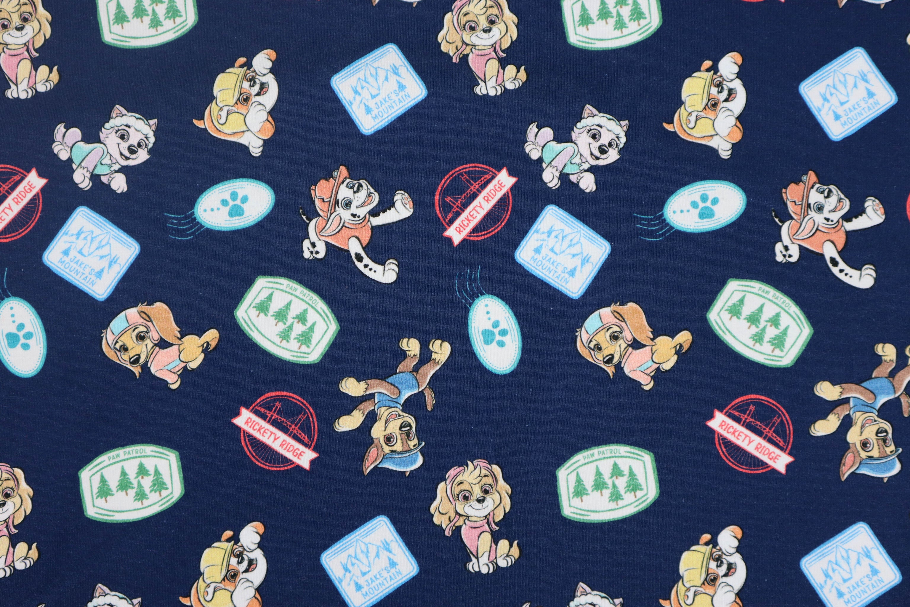 Baumwolljersey Paw Patrol - Sticker Print in dunkelblau bei Der Buntspecht